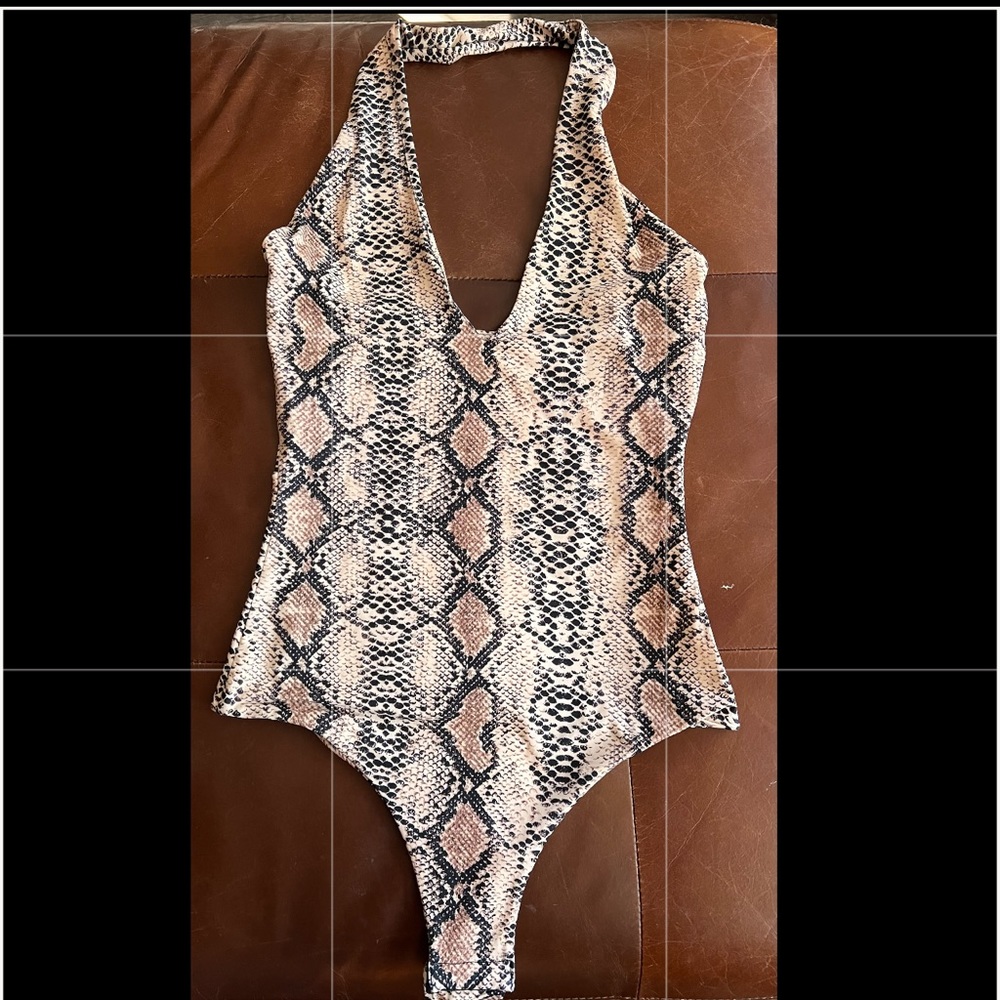 Snake print onesie